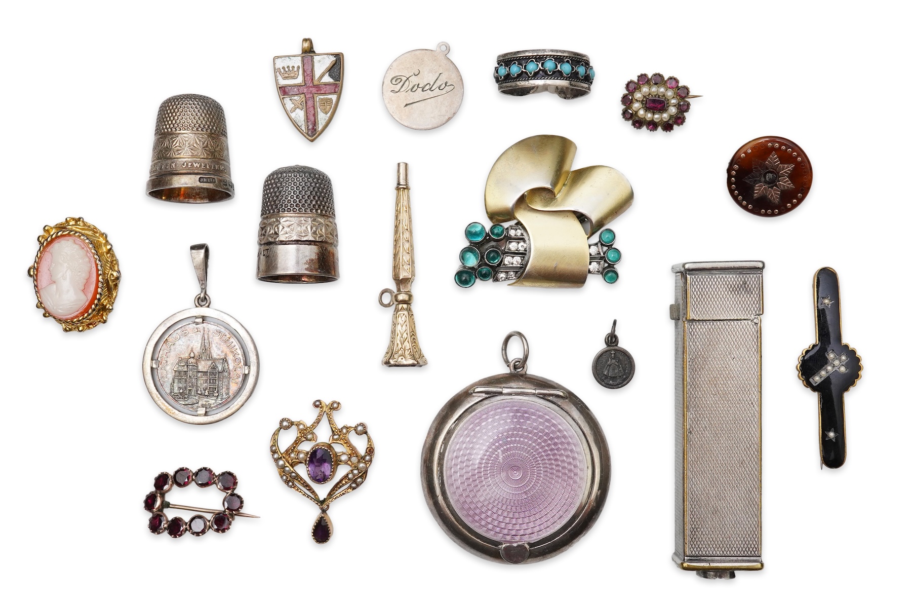 A small group of assorted collectables and jewellery including a Dunhill lighter, 64mm, a George V silver and enamel small compact, silver thimble, two Victorian garnet set brooches, an Edwardian 9ct, amethyst and seed p